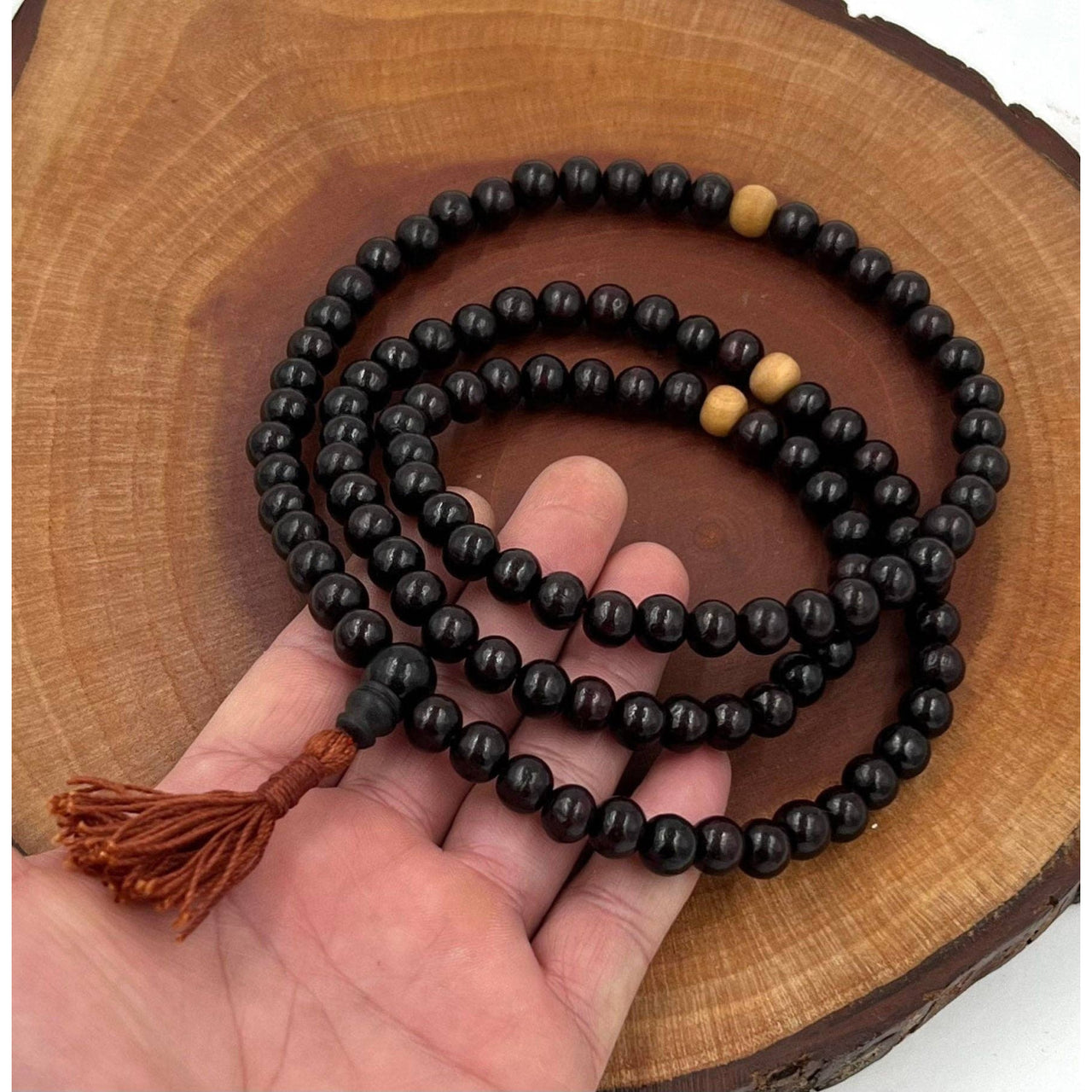 Dark brown beaded mala with tassel from Tibetan Buddhist Sandal Wood Rosary Necklace