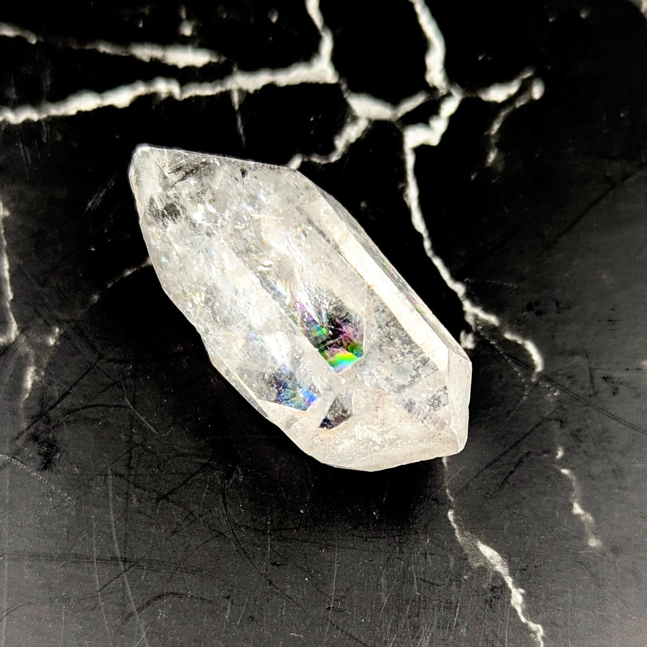 Tibetan Quartz 2.6’’ Point #BC1229 with rainbow reflections on cracked surface