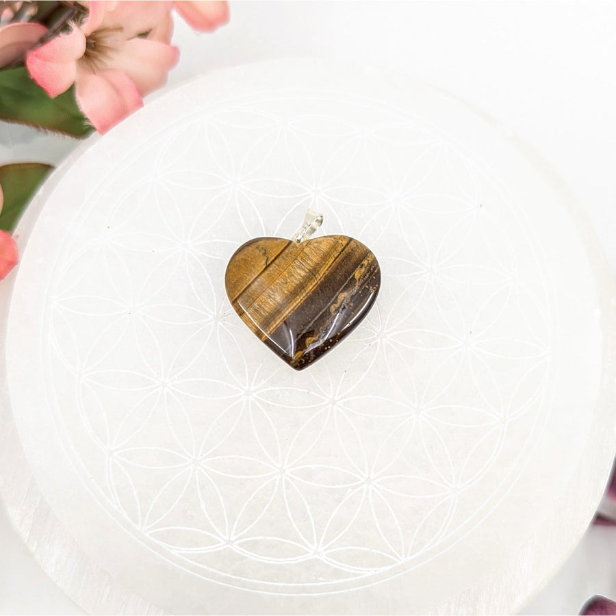 Heart-shaped Tiger’s Eye pendant displayed in the Tiger’s Eye 1 inch Heart Pendant #LV7963