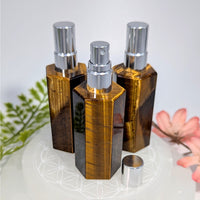 Three 3.25in Tiger’s Eye hexagonal perfume spray bottles with silver caps