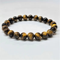 Tigers eye 8 mm stone bracelet with smooth round polished beads featuring golden and dark brown natural stripes