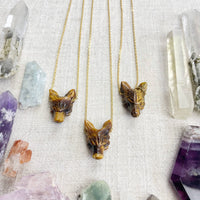 Three gold tiger eye carved wolf head pendants on 18’’ necklaces LV9098