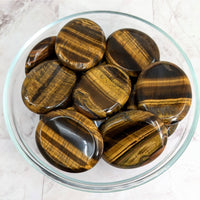 Thumbnail for Tiger’s Eye gems in a bowl featured in the Tiger’s Eye Gold Thumb Stone #LV2266