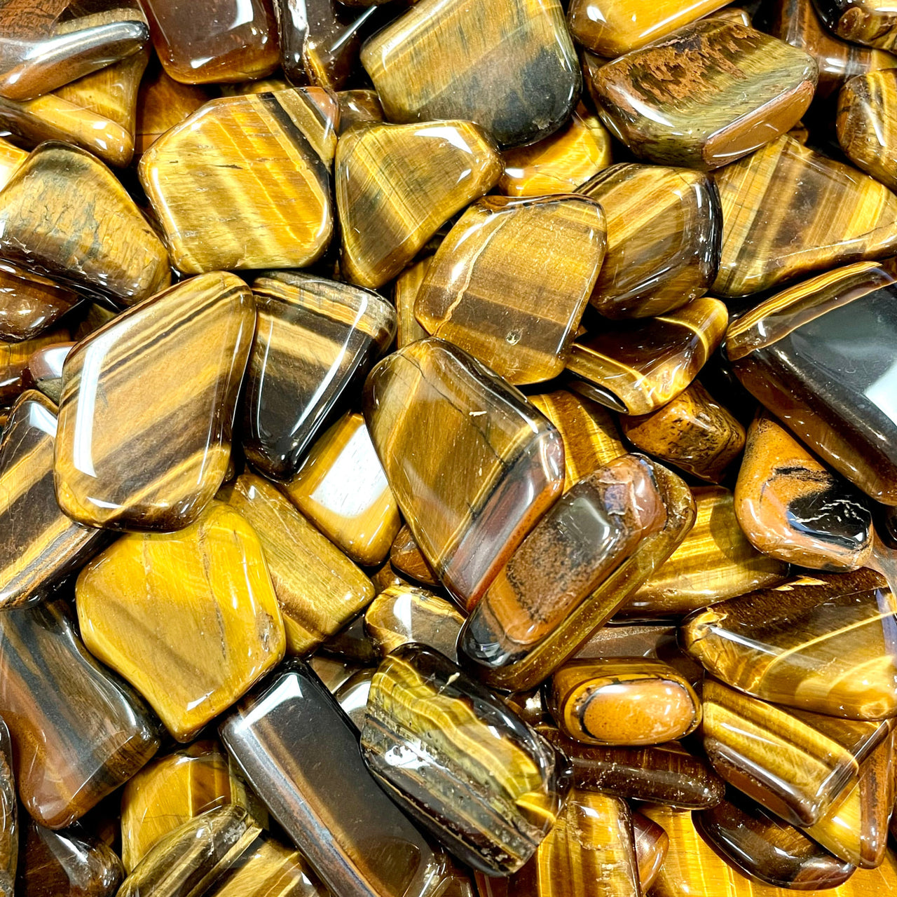 Polished Tiger’s Eye Tumbled #T323 with golden-brown striped patterns gemstones