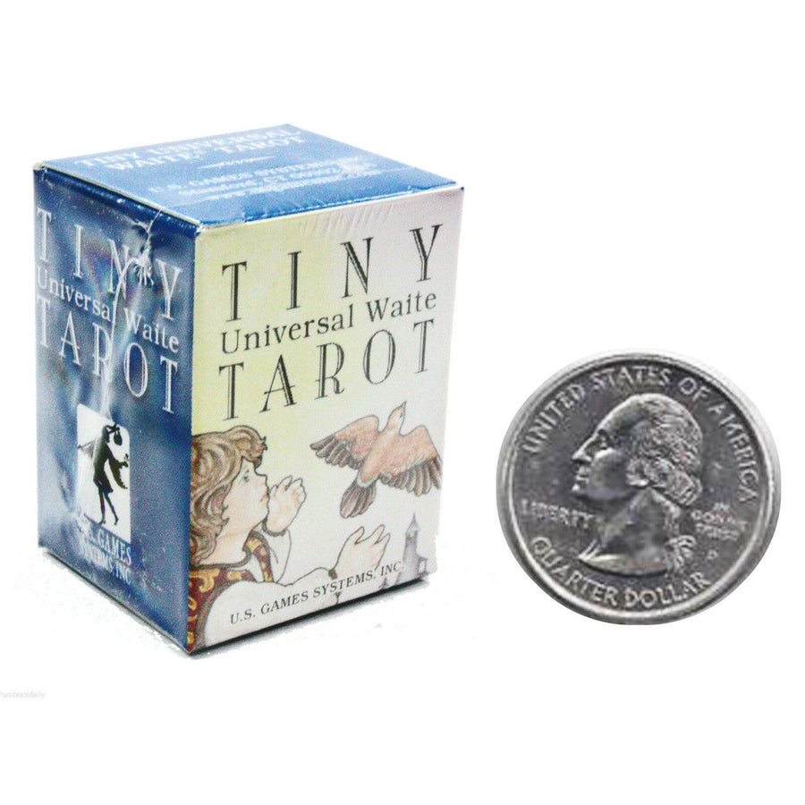 Close-up of a coin and Tiny Universal Waite® Tarot #TUW78 box