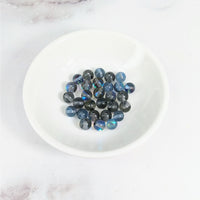 Thumbnail for White bowl of blue and black marble beads from Titanium Aura Quartz 6 mm Round Bead pack LV3625