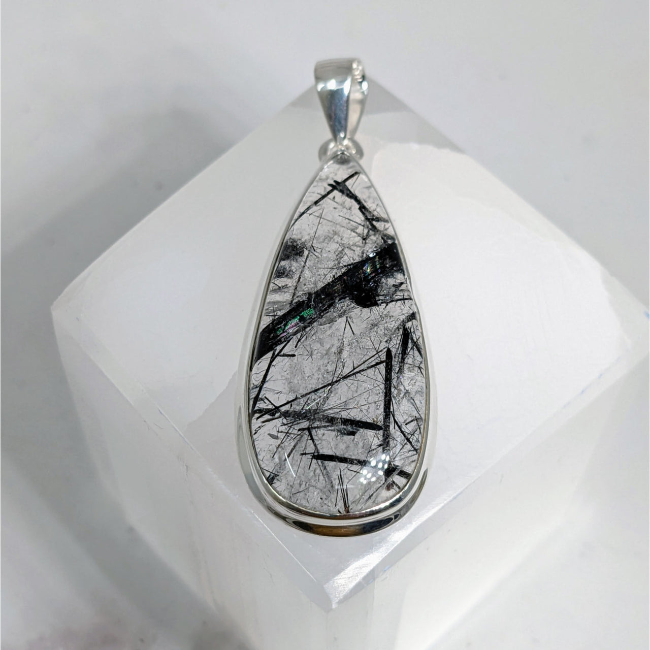 Tourmalinated Quartz 1.7’ Pendant S.S. #LV3900: Silver pendant with black and white marble tear