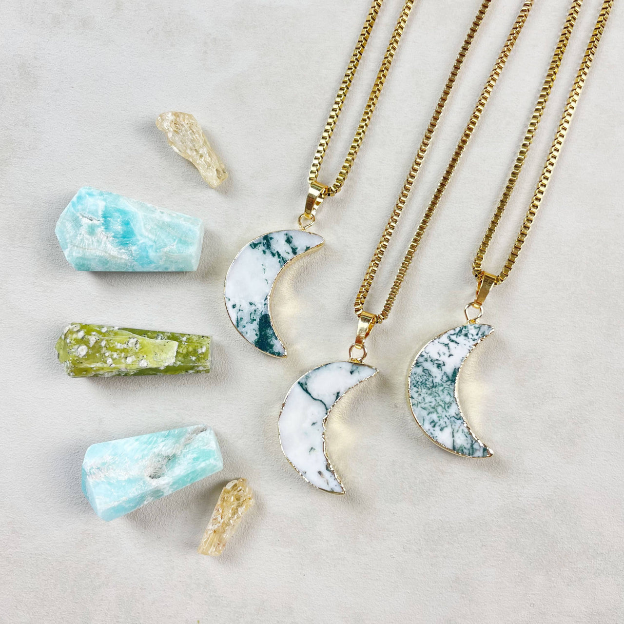 Three Tree Agate crescent moon pendants on 18’’ gold chains