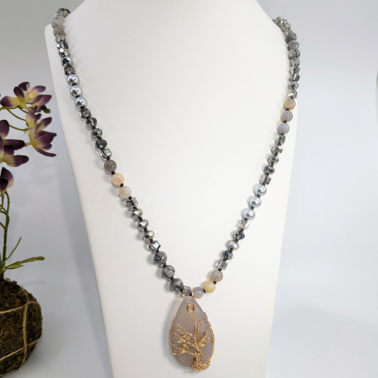 Beaded necklace with teardrop pendant from Tree of Life Wrap Silver 38-inch Beaded Necklace