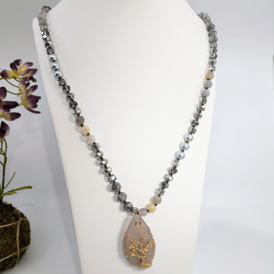 Beaded necklace with teardrop pendant from Tree of Life Wrap Silver 38-inch Beaded Necklace