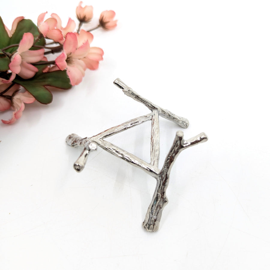 Silver-colored triangular branch-like metal sphere stand for decorative display