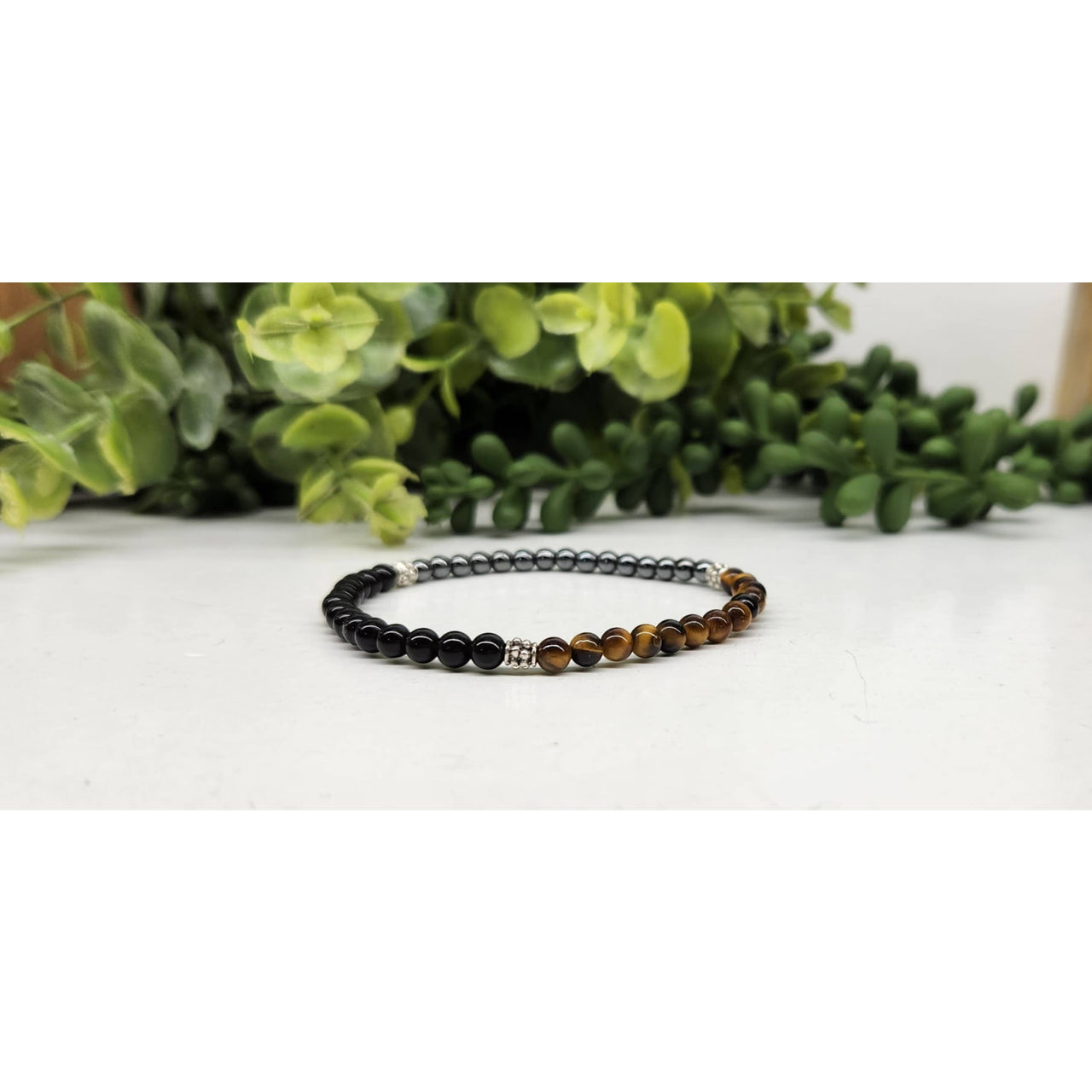 Black and brown beaded Triple Protection bracelet with silver accents LV9540