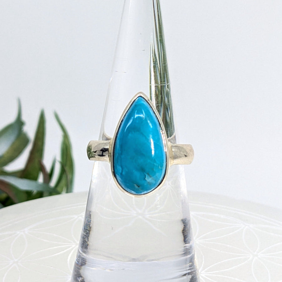 Turquoise teardrop ring in size 6.5 with Sterling Silver setting displayed