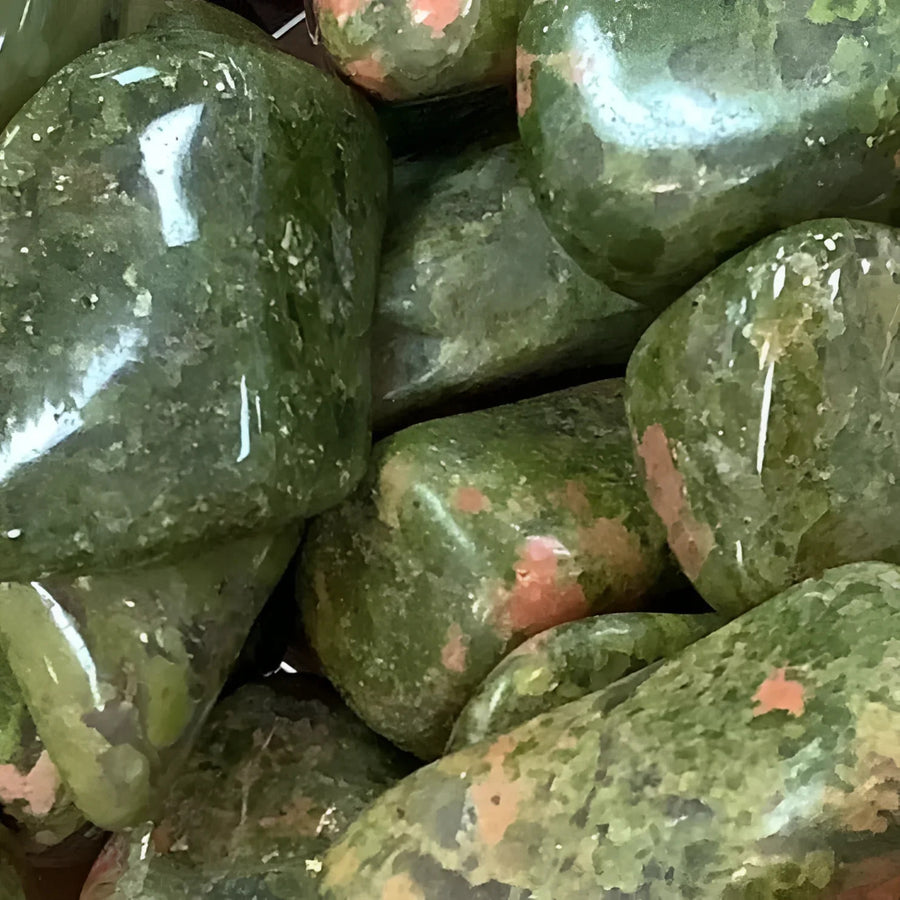 Polished Unakite stones in a Tumbled #T265 product display, vibrant and smooth finish