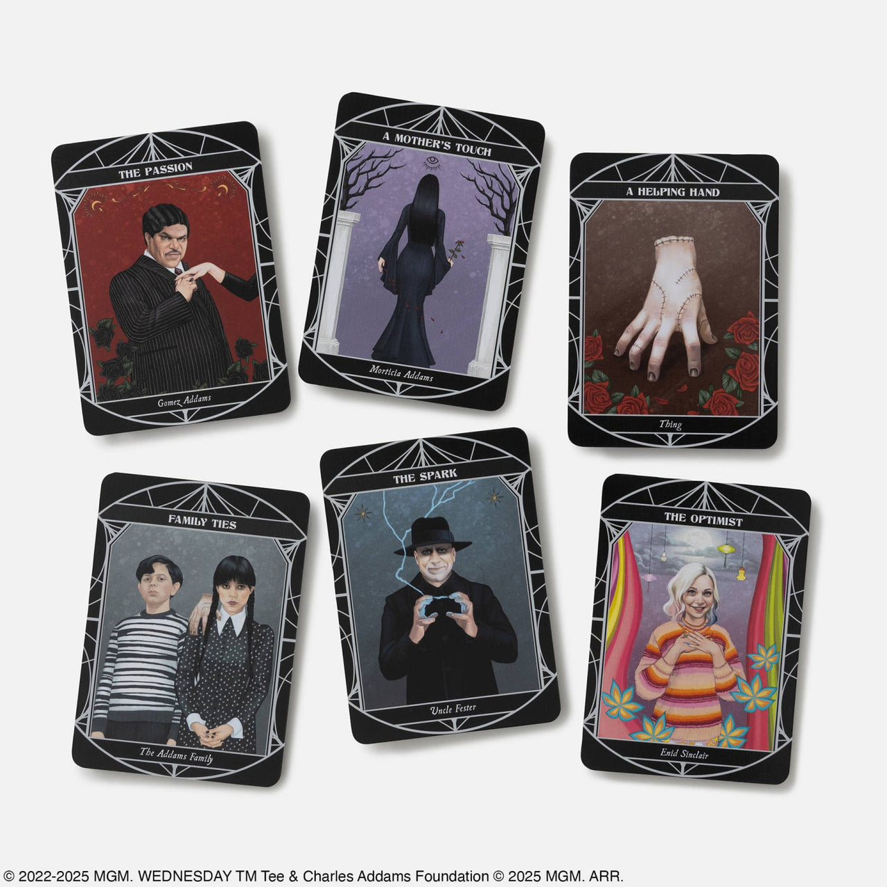 Set of six black-bordered wednesday official oracle deck tarot cards featuring character portraits and crystal motifs