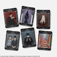 Set of six black-bordered wednesday official oracle deck tarot cards featuring character portraits and crystal motifs