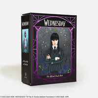 Black rectangular Wednesday official oracle deck box with purple border and Wednesday Addams in black uniform for crystals use