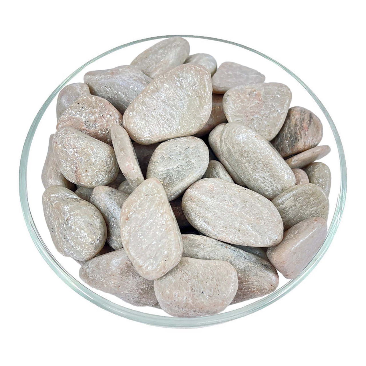 Bowl of white pebbles on marble counter with White Aventurine Tumbled Stone