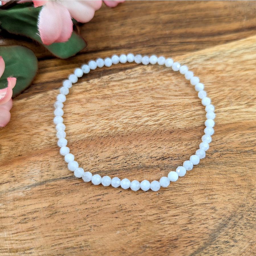 Delicate white beaded bracelet featuring White Moonstone 7-inch faceted 4mm beads