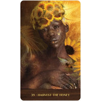 Dreamy portrait with sunflowers and golden light from Wild Woman Rising Oracle Deck