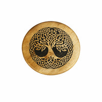 Wooden altar stool featuring circular coaster with dark carved celtic knot and tree of life design on natural wood grain