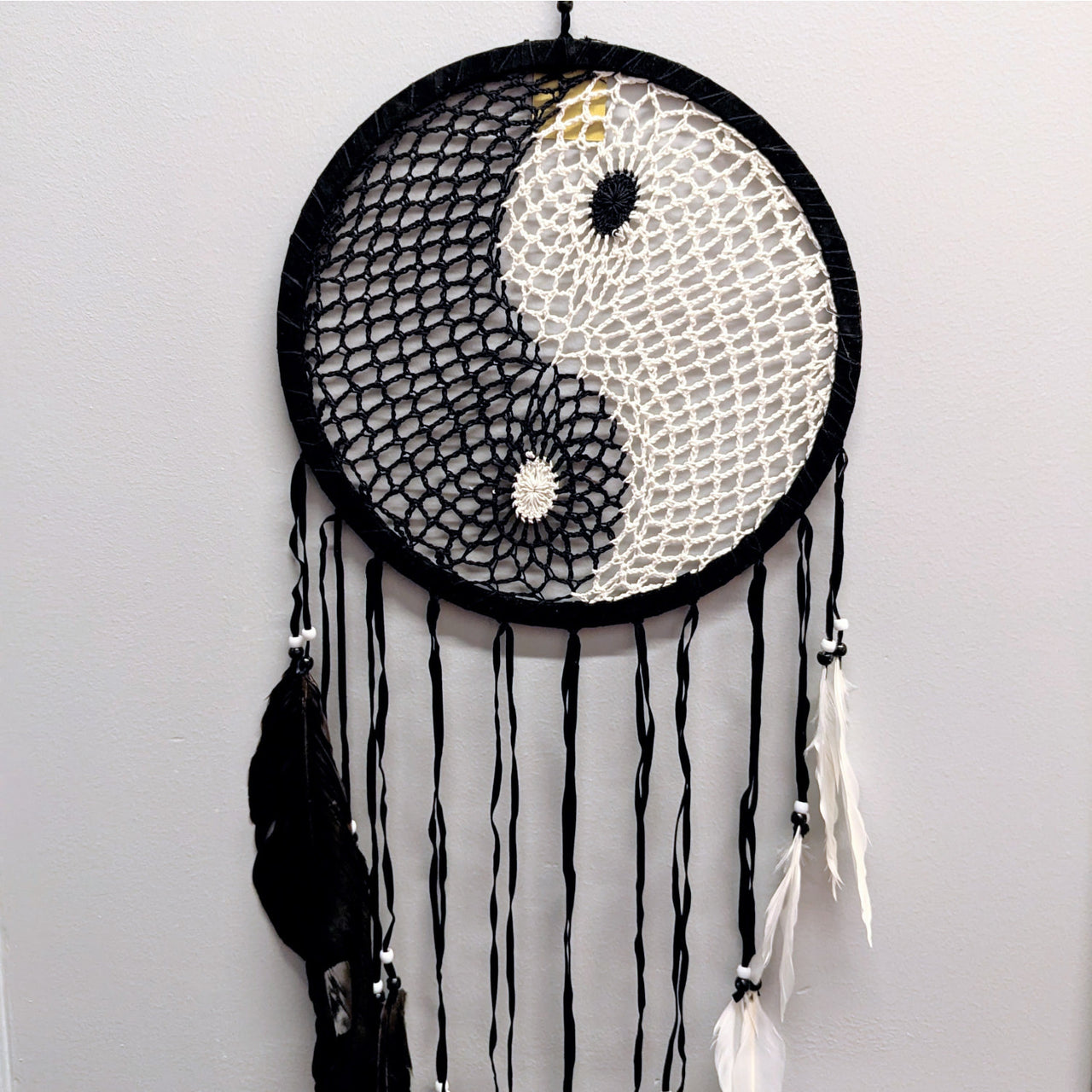 Yin Yang XL Crochet Dreamcatcher with black and white pattern and hanging feathers