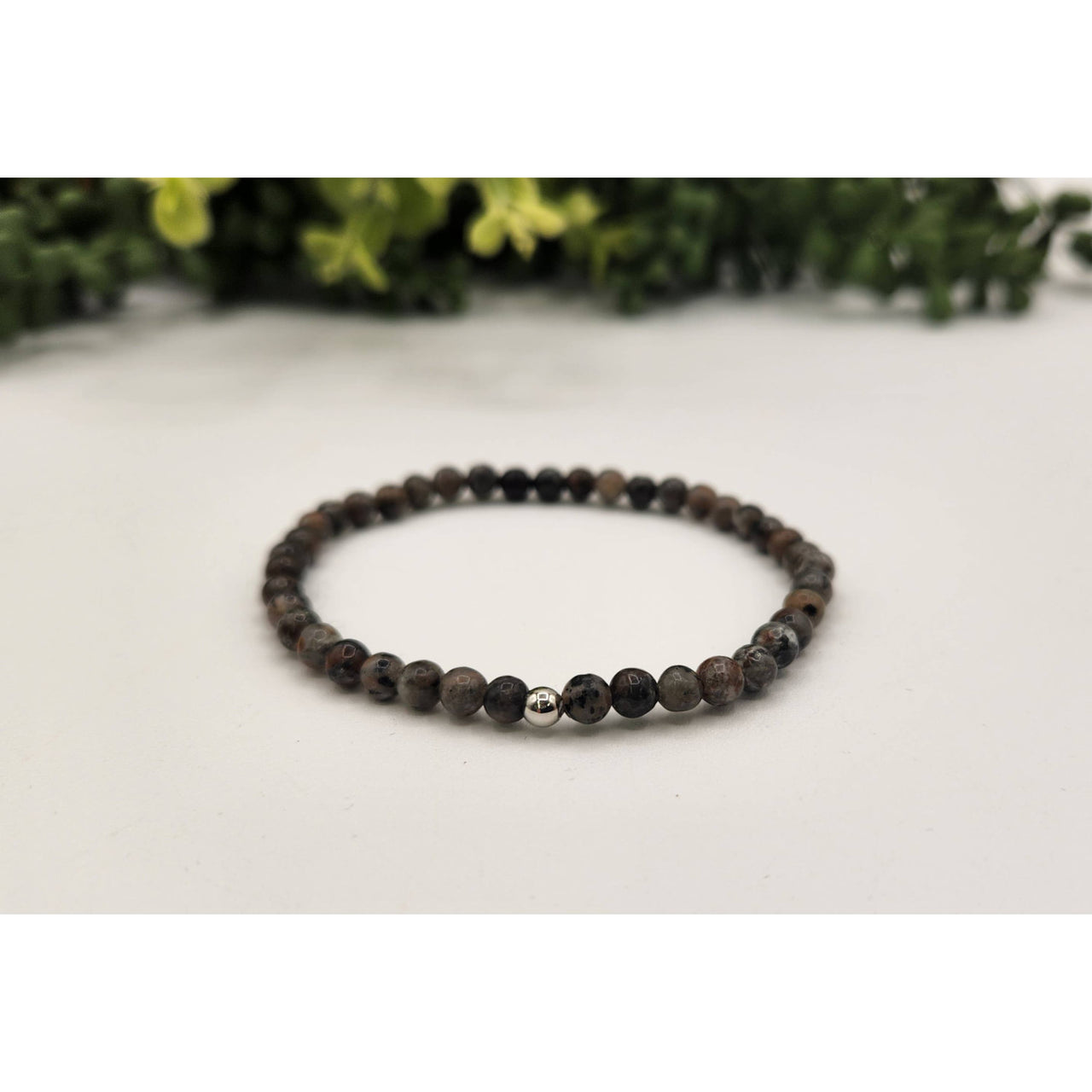 Black lava bead bracelet with silver accent, matte Yooperlite UV reactive 4mm