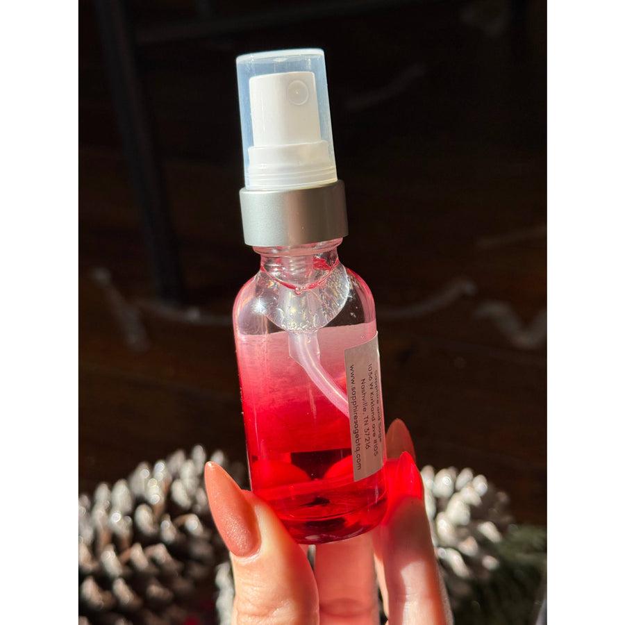 Yule Blessings 1oz Cleansing Spray LV9593 in clear glass bottle with red liquid