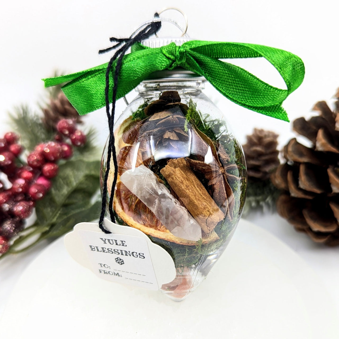 Yule Blessings 3.5’’ crystal ornament with cinnamon, anise, orange, moss, quartz