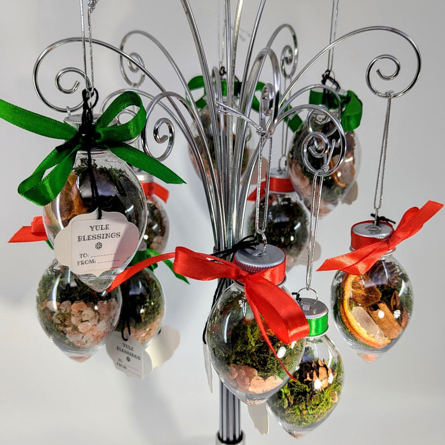 Yule Blessings 3.5’’ crystal ornament with moss, herbs, pink salt, orange, cinnamon, quartz point, ribbon