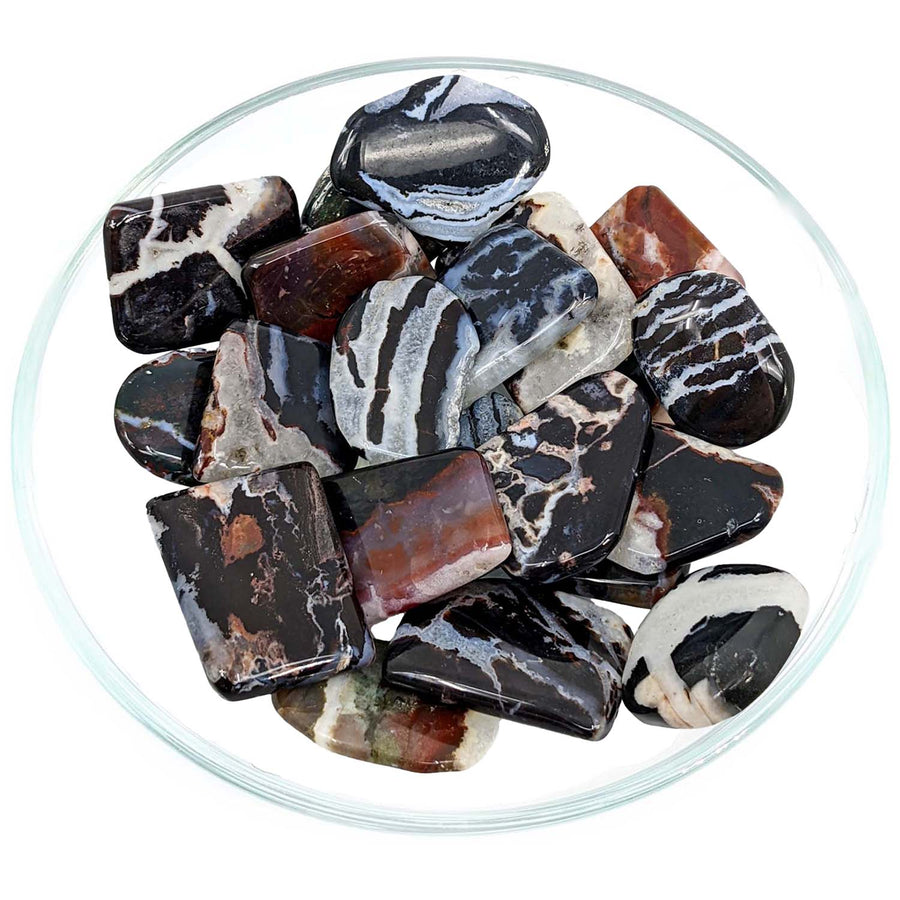 Bowl of colorful rocks highlighting Zebra Sardonyx Flat Polished Slice features